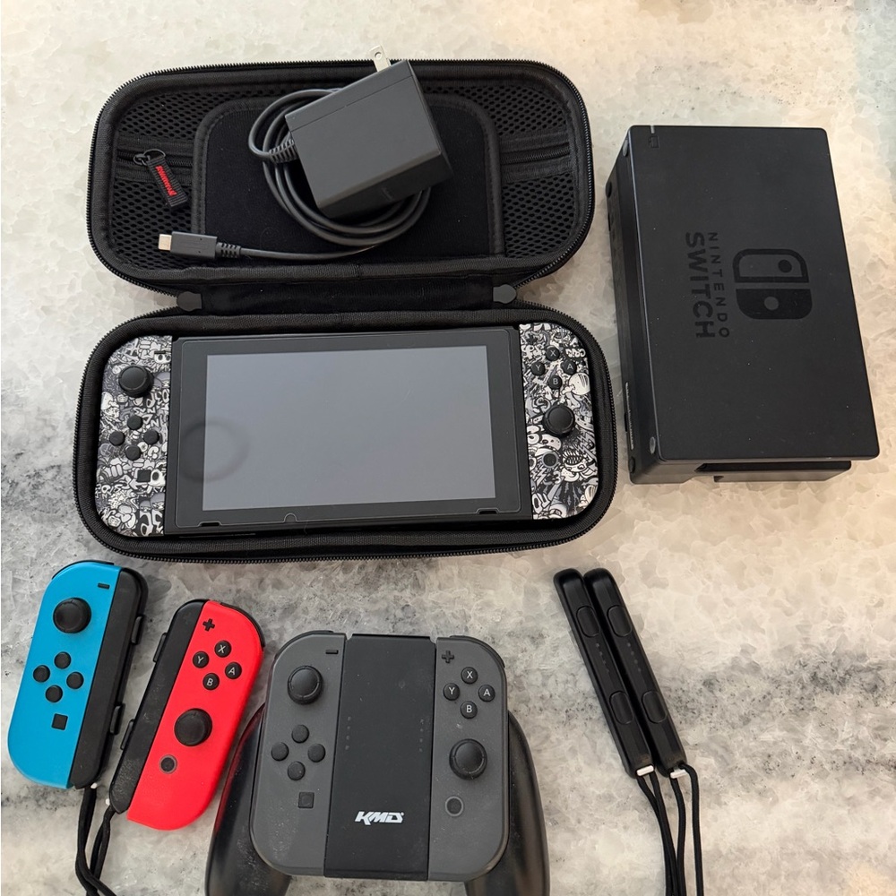 Nintendo Switch Console with Blue and Red Joy-Con
